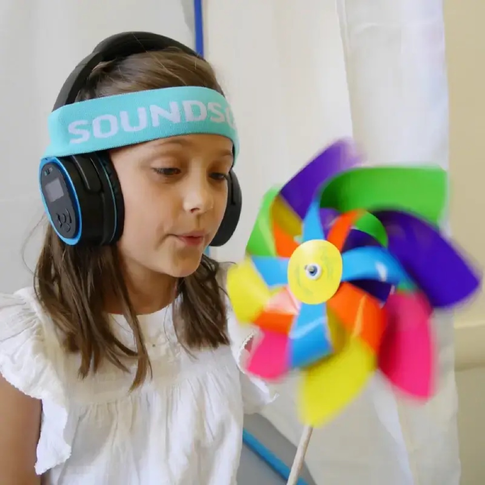 Dete koristi Soundsory slušalice tokom vežbe